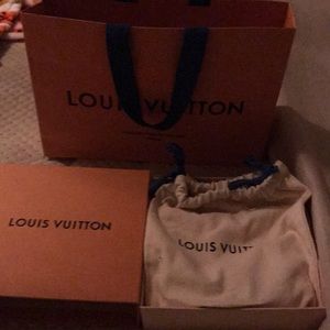 Louie Vuitton belt.  Box bag and receipt